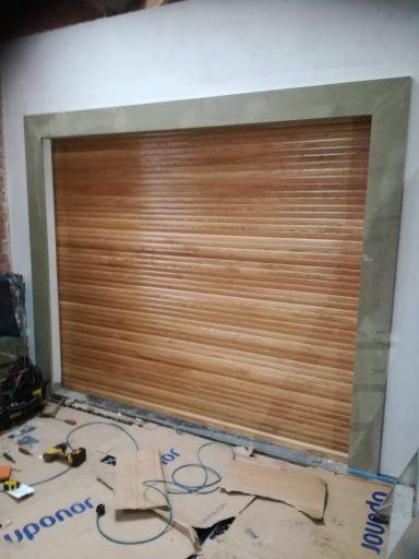 Solid timber roller shutter