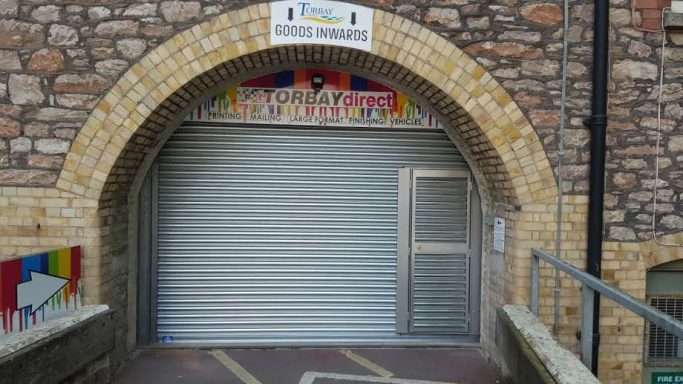 Steel roller shutter with door