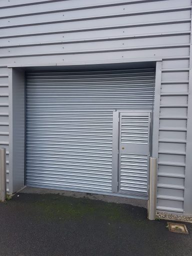Roller shutter with wicket door