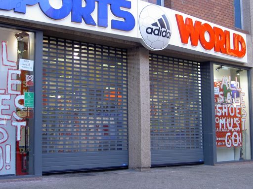 Punched and glazed roller shutter